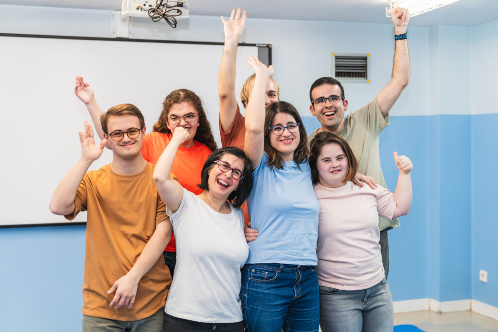 A heartwarming celebration moment with students with Down Syndrome after yoga.